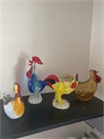 4 glass chickens
