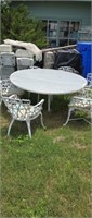 Large wrought, iron and wood outdoor table with