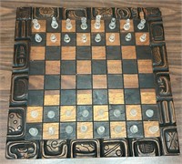 Wooden Chess board with glass game pieces.