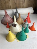 Plastic and metal funnels and oil cans