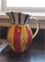 Decorative  pitcher approx 9 inches  tall