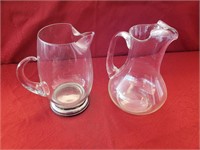 Two Large Glass Pitchers