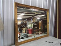 Antiqued gold toned mirror