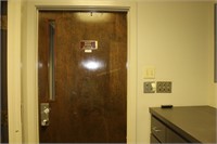 Two solid slab interior doors: One with combo lock