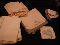 Group of mostly vintage table linens including