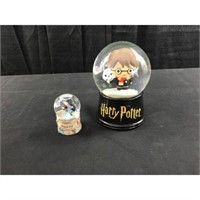 Two Harry Potter Snow Globes