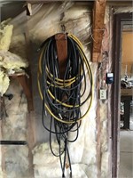 lot of hoses on wall