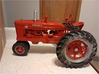farmall M display tractor back wheel is broke