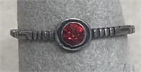 Silver ring with red stone