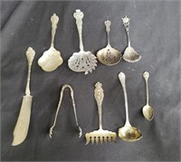 Bag of sterling silver serving utensils