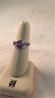 Size 8 cubic zirconium ring with light purple