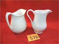 Two Vintage White Pitchers