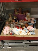 Assorted vintage baby dolls and more.