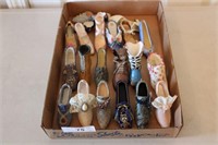 Box of collector miniture shoes