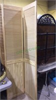 Two bifold half louvered doors, natural pine
