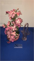 Artificial flowers in vase and crystal basket