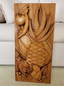 Carved wooden wall plaque featuring fruits. Season
