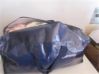 LARGE BAG WITH GUC CLOTHING PIECES