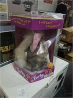 Furby with its box