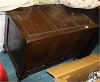 Large panelled storage chest.