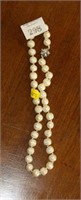 Chunky pearl necklace with diamante clasp.