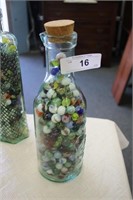 BOTTLE OF ANTIQUE MARBLES