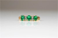 Yellow gold and emerald ring