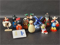 Eleven Small Wood and Porcelain Figurines