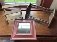 Framed mirror and display shelves