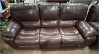 Brown leather couch- reclines on both ends 
86”