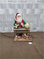Electric Santa making toys