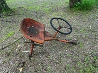 Antique Tractor Seat / Steering Wheel (side of