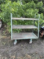 Metal shelf on wheels 54”x27”x60”