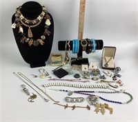 Costume jewelry bracelets, necklaces, brooches,