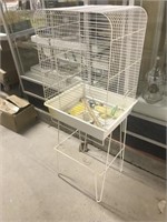 White wire bird cage on stand and accessories