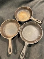 (2) 6 5/8" In Cast Iron Skillets (1) 6.5" Cast