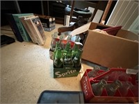 LOT OF SPRITE AND COKE BOTTLES AND CADDIES