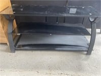 Glass top TV stand