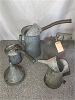 Antique oil cans and gas can