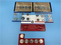 2 coin sets, 1987 P & D, 2009 state quarters "firs