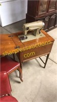 Kenmore sewing machine & cabinet