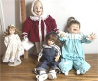 Lot of 4 Porcelain Dolls