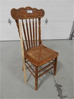Wood chair w/caned seat