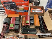 LIONEL TRAIN SET AND TRACK - 4 BOXES