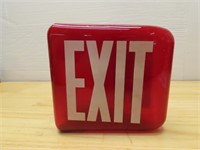 Red glass Exit sign.