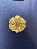 Gold tone floral brooch