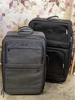 2 Larger Black Suitcases