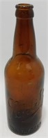 * Antique Brown “Schlitz” Bottle - 9 1/8” Tall