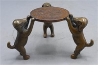 COPPER ALLOY 'THREE DOGS' CANDLE STAND