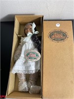 Cottage collectable doll in original box near new
